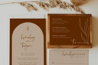 16 a chic minimalist invitation suite with burgundy and neutral parts, with calligraphy and modern lettering and botanical prints
