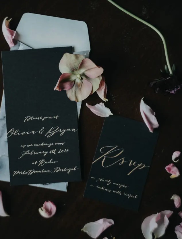 an elegant black rock n roll wedding stationery suite with gold calligraphy - you won't need more for your rock wedding