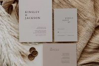 22 an elegant neutral-colored minimalist wedding invitation suite in light grey and dusty pink, with black lettering is a cool idea