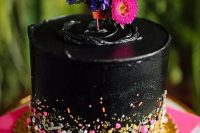 24 a colorful rock wedding cake with bright confetti, bright blooms and greenery on top is a great idea for a rock n roll wedding