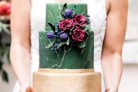 30 a bold wedding cake with green marble tiers and a gold one, with purple and pink fresh and sugar blooms and greenery is a chic idea for the fall