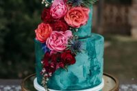 35 a gorgeous emerald textural wedding cake decorated with red, orange, burgundy, hot pink blooms and foliage for a colorful wedding in the fall