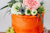 51 a textural orange wedding cake with fresh blooms, thistles and greenery is a lovely and bold idea for colorful wedding