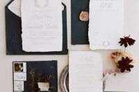 a black and white wedding invitation suite of handmade paper, calligraphy and gold seals is a lovely idea for a refined wedding