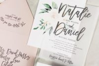 a blush, watercolour floral and vellum invite, with modern black calligraphy and floral prints is fantastic
