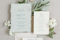 a delicate light green and neutral wedding invitation suite of usual and handmade paper, with calligraphy and creamy seals