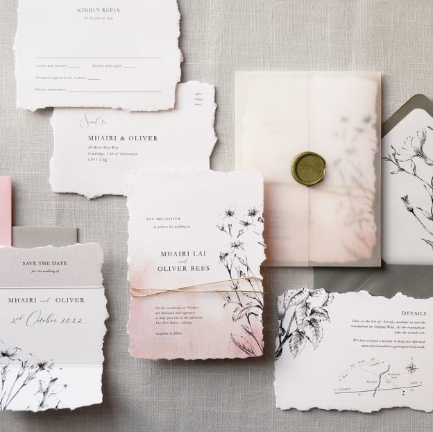 a gorgeous suite combines delicate watercolours with mixed textures stunning ink etchings and blush vellum