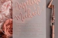 a vellum wedding invitation with rose gold calligraphy is a lovely idea for a romantic wedding with rose gold or just rose