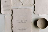 organic, torn edged wedding invitations of handmade paper are a great idea for a neutral spring or summer wedding