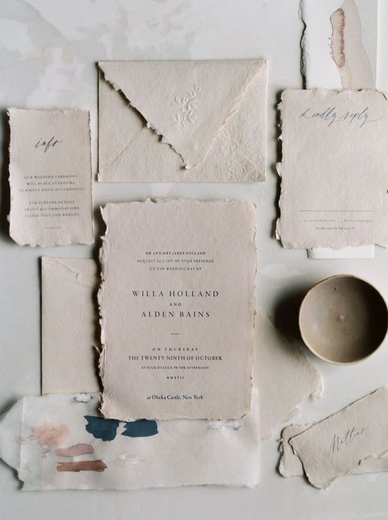 organic, torn edged wedding invitations of handmade paper are a great idea for a neutral spring or summer wedding
