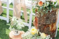 42 pretty rustic wedding aisle decor done with tree stumps, white, yellow and blush blooms in jars and a cup is a great idea for a rustic wedding