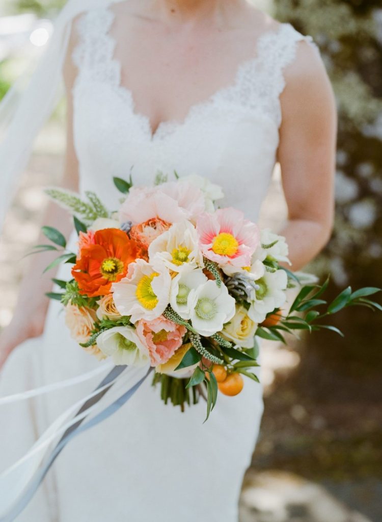 a laconic summer wedding bouquet of pink, coral and white poppies, greenery, astilbe and some citrus is a gorgeous idea
