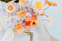 an artful wedding bouquet of lilac and peachy blooms, some muted color poppies is an amazing idea for a spring bride