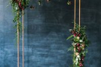 08 a laconic modern wedding chuppah decorated with greenery, neutral and bold blooms and chic copper candle lanterns is amazing