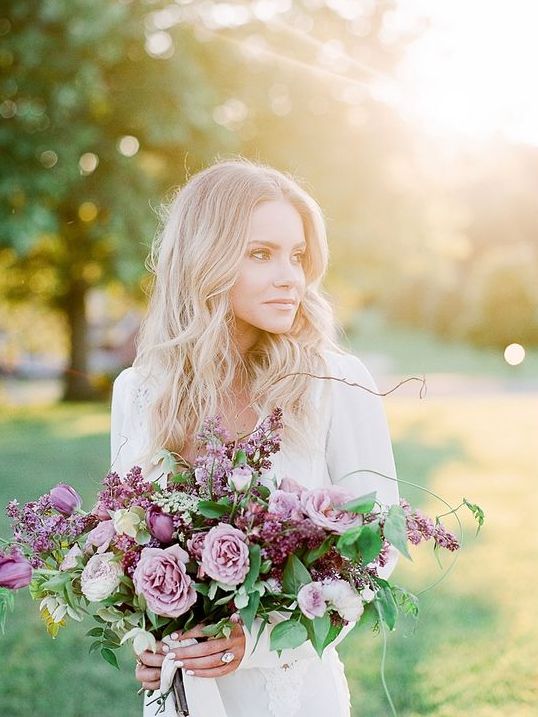a delicate mauve and purple wedding bouquet with twigs, greenery and berries is an amazing idea for summer or fall