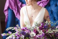 15 a fantastic purple wedding bouquet with pink and lilac blooms, white anemones and greenery and pale leaves plus grey and purple ribbon