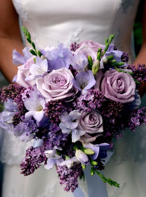 a monochromatic wedding bouquet with purple, lilac and mauve blooms is a lovely idea for a spring or summer wedding