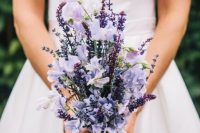 33 a modest yet catchy wedding bouquet with lilac blooms and lavender is a cool idea for a summer or summer to fall bride