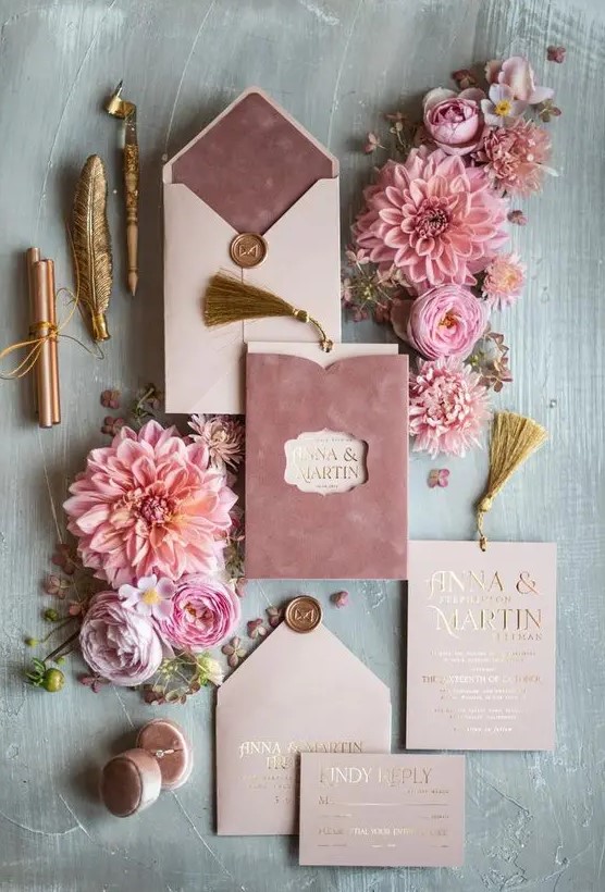 a beautiful and delicate wedding invitation suite with blush and lilac velvet touches, gold stencils and gold printing for a spring or summer wedding