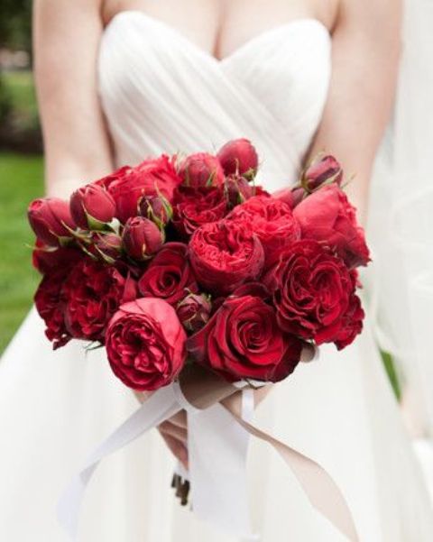 a classic red rose and peony wedding bouquet is your perfect bold touch for a wedding, it never goes out of style