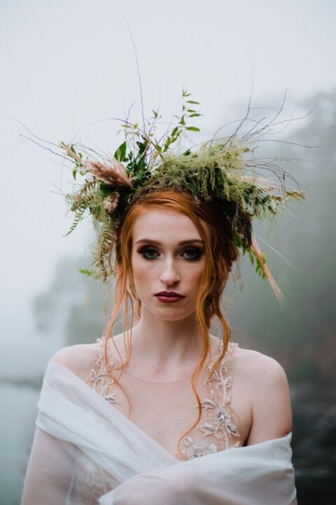 a dimensional and textural wild greenery crown with various types of foliage and twigs plus wheat is a gorgeous idea for a free-spirited wedding
