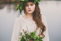 a fantastic dimensional crown with holly, thistles, berries and lots of various leaves is a gorgeous idea for a Christmas wedding