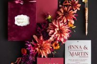 a fuchsia velvet and hot pink wedding invitation suite with gold printing and amber seals is a lovely idea for a berry-hued fall wedding