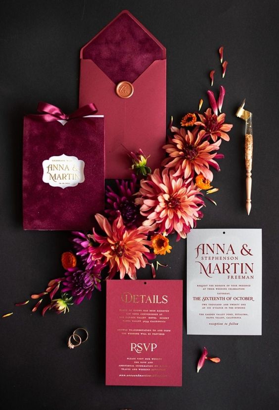 a fuchsia velvet and hot pink wedding invitation suite with gold printing and amber seals is a lovely idea for a berry-hued fall wedding