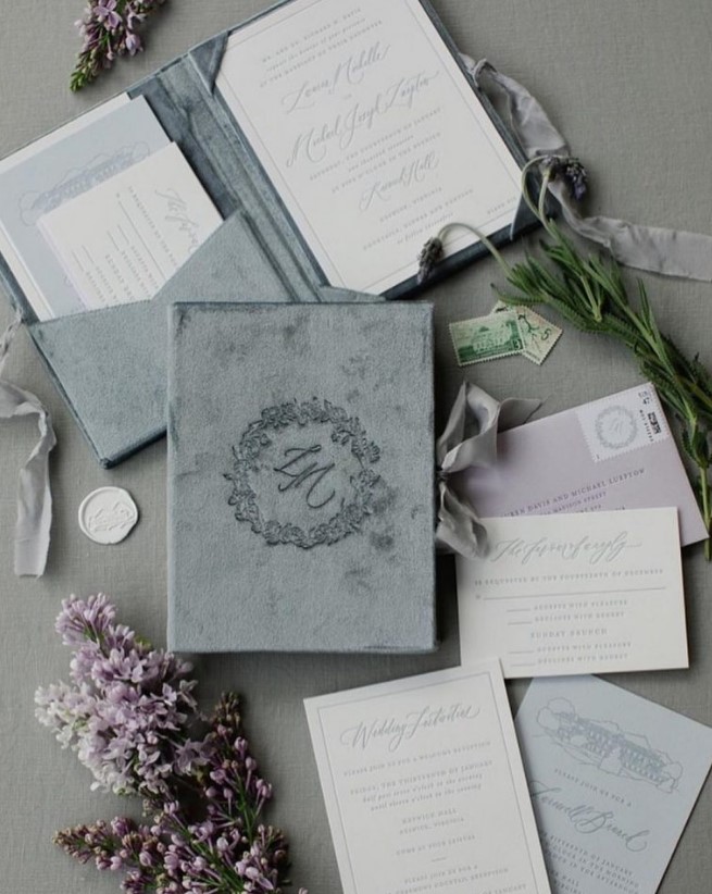a grey velvet wedding invitation suite with calligraphy and grey, lilac and neutral parts and envelopes with chic lettering