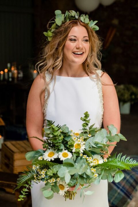 a lovely foliage bridal crown paired with fern, eucalyptus and white chamomiles in the bouquet create a relaxed and beautiful look