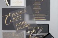 a matte black and sheer wedding invitation set with gold letters and gold foil decor for a bold statement