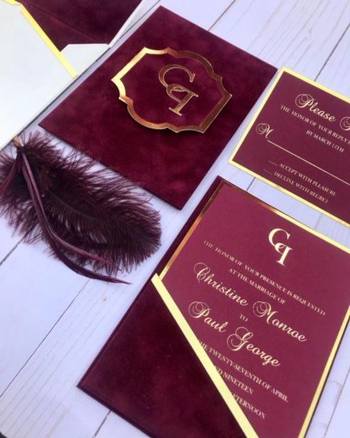 a refined burgundy velvet plus fuchsia and gold wedding invitation suite with calligraphy and elegant printing