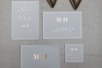 a sophisticated modern wedding invitation suite in neutrals and with rose gold foil letters and calligraphy is a lovely idea for a refined wedding