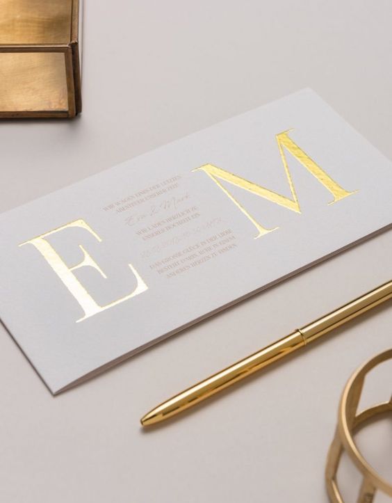 a super chic modern card with gold foil calligraphy is a lovely idea for a modern wedding, it looks very laconic and chic