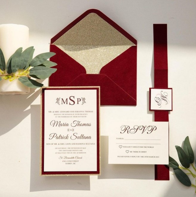 a super stylish red velvet and gold glitter wedding invitation suite with calligraphy and stylish lettering is amazing for a Christmas wedding