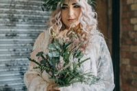a textural boho bridal crown that includes eucalyptus and thistles is a pretty way to add dimension and texture to the look