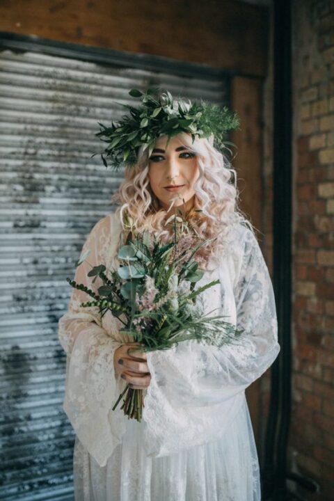 a textural boho bridal crown that includes eucalyptus and thistles is a pretty way to add dimension and texture to the look