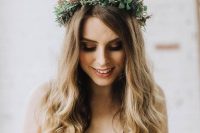 a winter bridal crown done with foliage, pinecones and much texture is a lovely idea for a boho bride