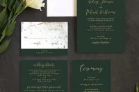 an emerald and gold wedding invitation suite with a marble pattern and goild foil looks very chic and refined