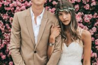 from her flowy lace and tulle wedding dress to her tousled waves and olive leaf tiara, this bride is bohemian incarnate