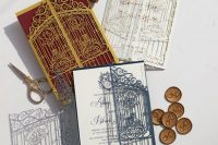 gorgeous and eye-catchy laset cut wedding invitations in a range of colors, imitating a vintage forged gate are jaw-dropping