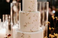 03 a white wedding cake with gold constellations and a delicate star half moon cake topper is a lovely idea