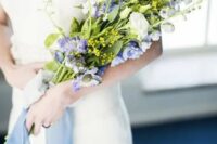 10 a cute and simple summer wedding bouquet of white roses and blue delphinium is a chic and cool idea for spring or summer