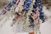 12 a fantastic long stem wedding bouquet composed of pink, white and blue delphinium is a lovely solution to make a statement