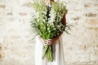 14 a large white bloom and greenery and grass long stem wedding bouquet is a fantastic solution for a spring or summer bride