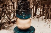 15 a black and teal celestial wedding cake with white constellations, with a gold sphere in between and a half moon cake topper