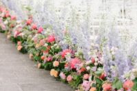34 chic and colorful wedding summer aisle decor done with greenery, pink and orange peony roses and purple delphinium