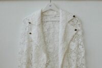 02 a beautiful and sophisticated white lace bridal jacket styled as a moto one is a unique solution to rock