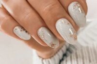 02 a stylish and timeless grey and gold foil nail design will match many bridal looks and styles