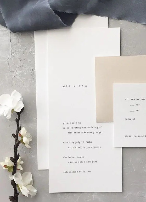 a lovely neutral wedding invitation suite in white and tan, with modern lettering and of simple shapes is a cool idea for a minimalist wedding